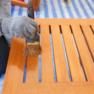 close-up-brush-hand-painting-wooden-furniture_30478-3594.jpg
